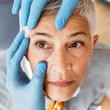 Woman With Cataracts Being Examined